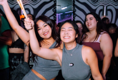 Guests smiling at Time Nightclub