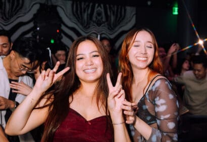 Guests smiling at Time Nightclub