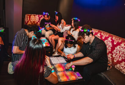 Guests making kandi at Flashback at Time Nightclub