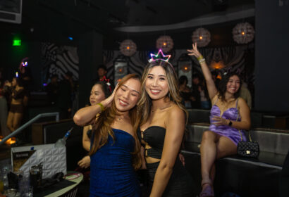 Guests posing at Time Nightclub in Orange County