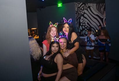 Guests posing at Time Nightclub in Orange County