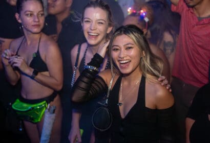 Guests posing at Time Nightclub in Orange County