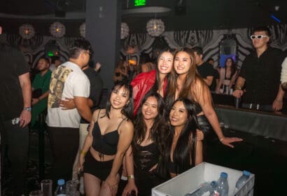 Guests posing at Time Nightclub in Orange County