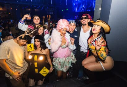 Guests posing at Wuki on Halloween Night at Time Nightclub in Costa Mesa