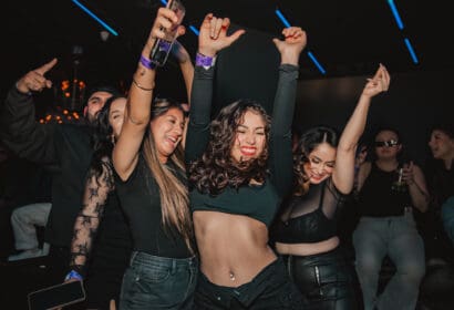 Guests posing at San Pacho at Time Nightclub in Costa Mesa, CA