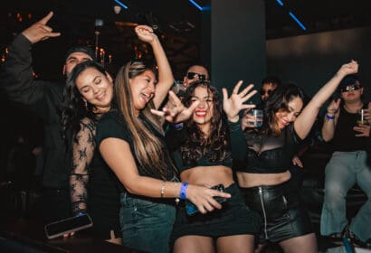 Guests posing at San Pacho at Time Nightclub in Costa Mesa, CA