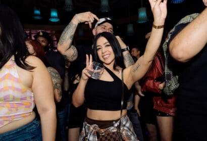 Guests posing at Wax Motif at Time Nightclub in Costa Mesa, CA