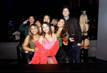 Guests posing at Wax Motif at Time Nightclub in Costa Mesa, CA