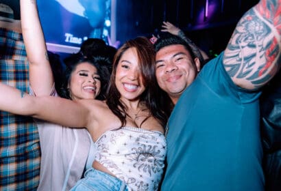 Guests posing at Time Machine at Time Nightclub in Costa Mesa, CA