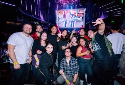 Guests posing at Time Machine at Time Nightclub in Costa Mesa, CA