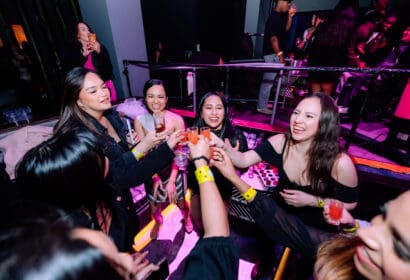 Guests posing at Time Machine at Time Nightclub in Costa Mesa, CA