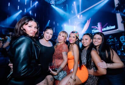 Guests posing at Time Machine at Time Nightclub in Costa Mesa, CA