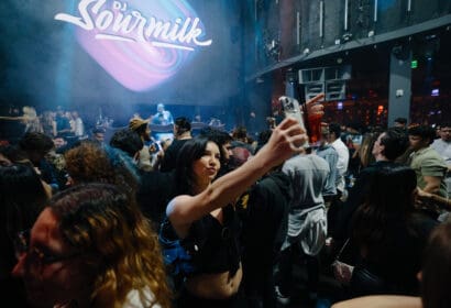 Guests posing at DJ SOURMILK at Time Nightclub in Costa Mesa, CA