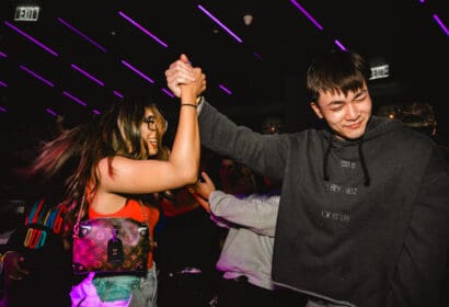 Guests posing at JOYRYDE at Time Nightclub in Costa Mesa, CA