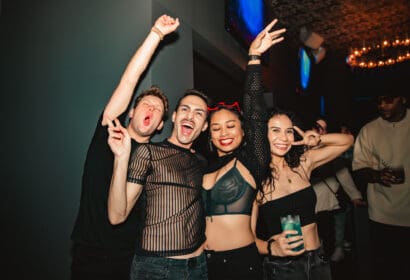 Guests posing at JOYRYDE at Time Nightclub in Costa Mesa, CA