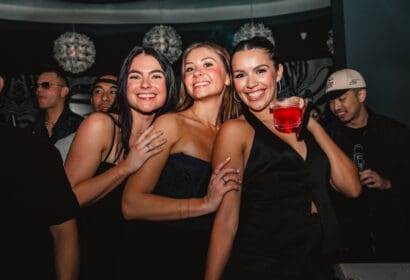 Guests posing at Sidepiece at Time Nightclub in Costa Mesa, CA