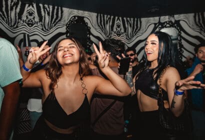 Guests posing at Sidepiece at Time Nightclub in Costa Mesa, CA