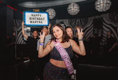 Guests posing at Sidepiece at Time Nightclub in Costa Mesa, CA