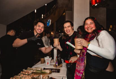 Guests posing at Henry Fong's Night Market at Time Nightclub in Costs Mesa, CA