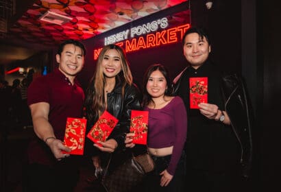 Guests posing at Henry Fong's Night Market at Time Nightclub in Costs Mesa, CA