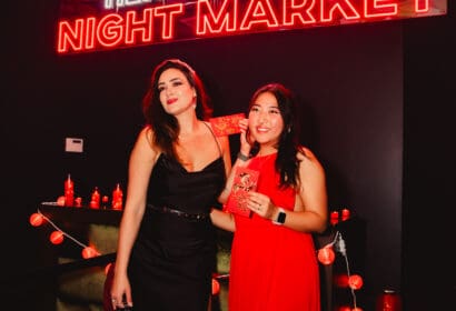 Guests posing at Henry Fong's Night Market at Time Nightclub in Costs Mesa, CA