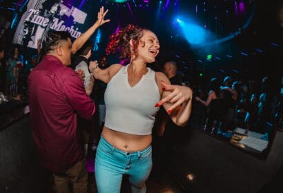 Guests posing at Time Machine at Time Nightclub in Costa Mesa, CA