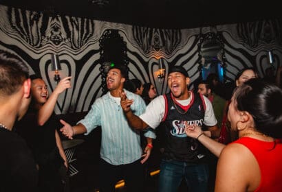 Guests posing at Time Machine at Time Nightclub in Costa Mesa, CA