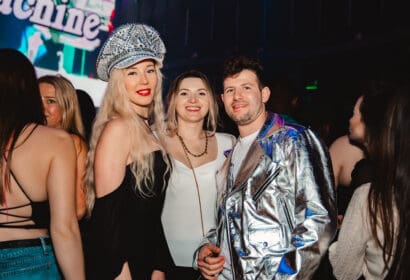 Guests posing at Time Machine at Time Nightclub in Costa Mesa, CA