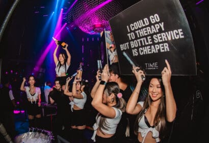 Bottle service posing at Time Machine at Time Nightclub in Costa Mesa, CA