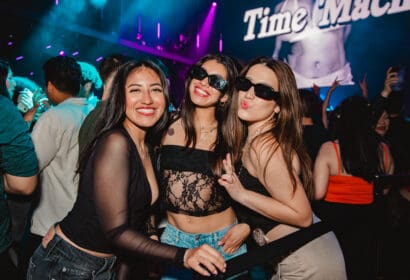 Guests posing at Time Machine at Time Nightclub in Costa Mesa, CA