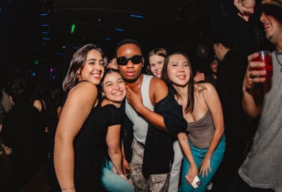 Guests posing at Time Machine at Time Nightclub in Costa Mesa, CA