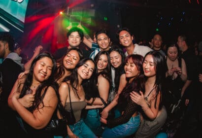 Guests posing at Time Machine at Time Nightclub in Costa Mesa, CA