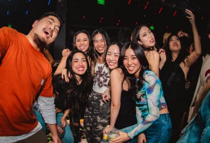 Guests posing at Time Machine at Time Nightclub in Costa Mesa, CA