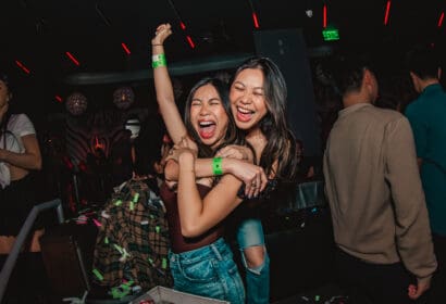 Guests posing at Time Machine at Time Nightclub in Costa Mesa, CA