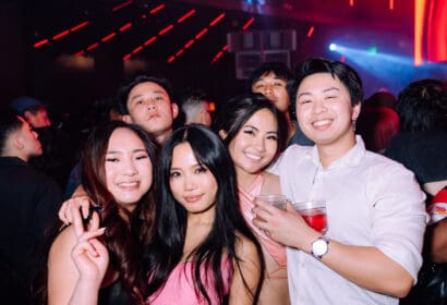 Guests posing at BLXST at Time Nightclub in Costa Mesa, CA