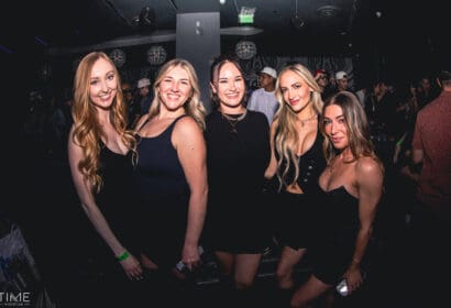 Guests posing at Kyle Watson at Time Nightclub in Costa Mesa, CA