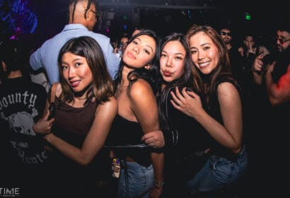 Guests posing at Kyle Watson at Time Nightclub in Costa Mesa, CA