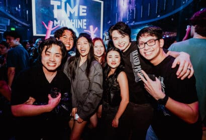 Guests posing at Time Machine at Time Nightclub in Costa Mesa, CA