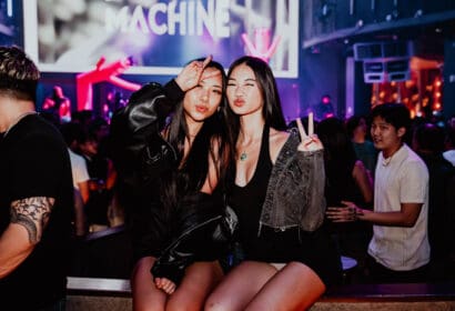 Guests posing at Time Machine at Time Nightclub in Costa Mesa, CA