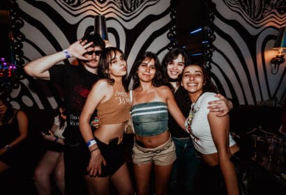 Guests posing at Time Machine at Time Nightclub in Costa Mesa, CA