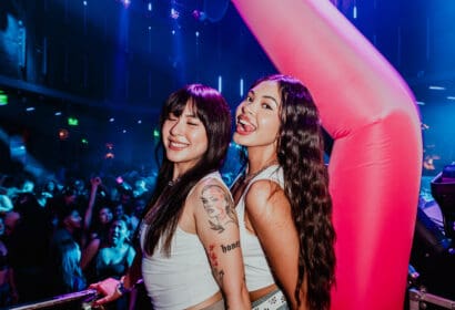 Guests posing at Time Machine at Time Nightclub in Costa Mesa, CA
