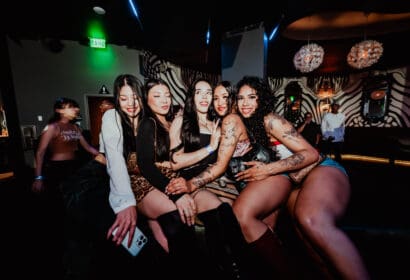 Guests posing at Time Machine at Time Nightclub in Costa Mesa, CA