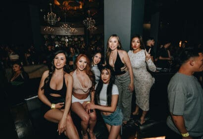 Guests posing at OhGeesy + DJ Vision at Time Nightclub in Costa Mesa, CA