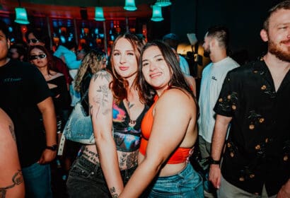 Guests posing at AC Slater at Time Nightclub in Costa Mesa, CA