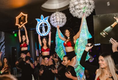 Bottle service posing at R3HAB at Time Nightclub in Costa Mesa, CA