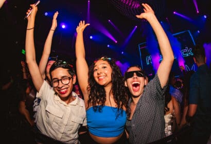 Guests posing at Flashback at Time Nightclub in Costa Mesa, CA