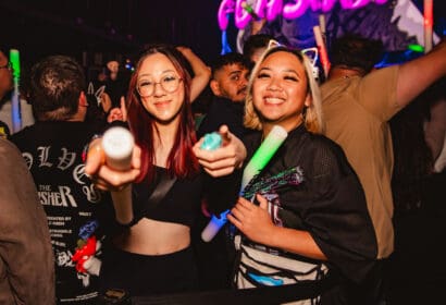Guests posing at Flashback at Time Nightclub in Costa Mesa, CA