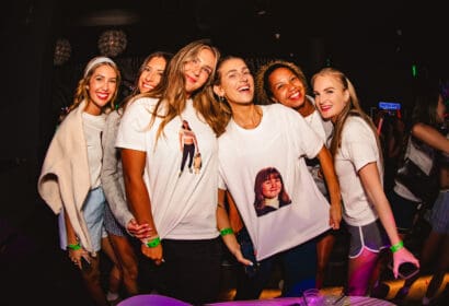 Guests posing at Flashback at Time Nightclub in Costa Mesa, CA