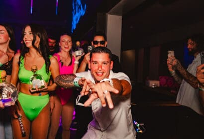 Guests posing at Flashback at Time Nightclub in Costa Mesa, CA