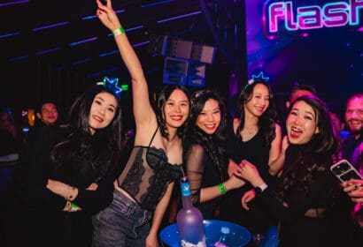 Guests posing at Flashback at Time Nightclub in Costa Mesa, CA